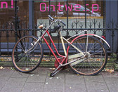 Throughout the city bicycles in disrepair have been abandoned by their owners.