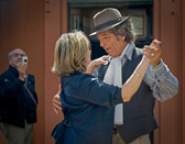 He makes his  living by dancing the tango with Buenos Aires tourists.