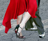 A close up of a tango step performed  by Mirabel and Julio.