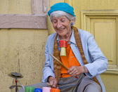 This senior street performer continues to find joy in her work.