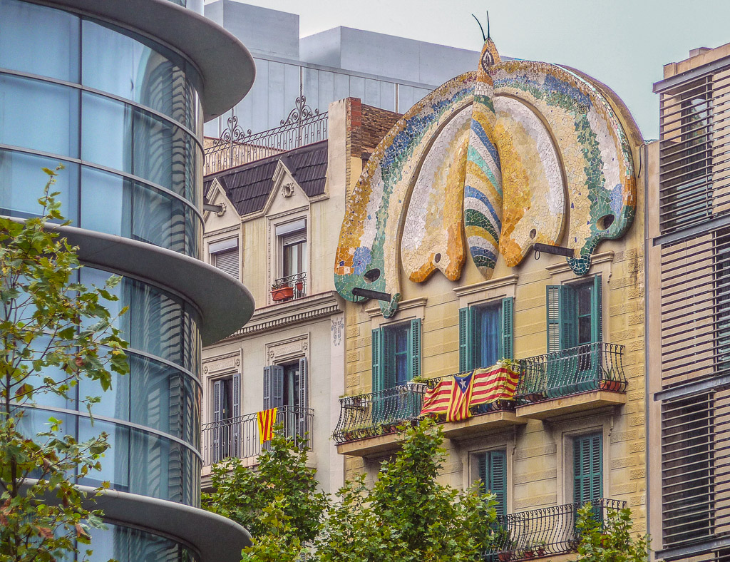 Gaudi influence contrasts with the more modern building across the street.