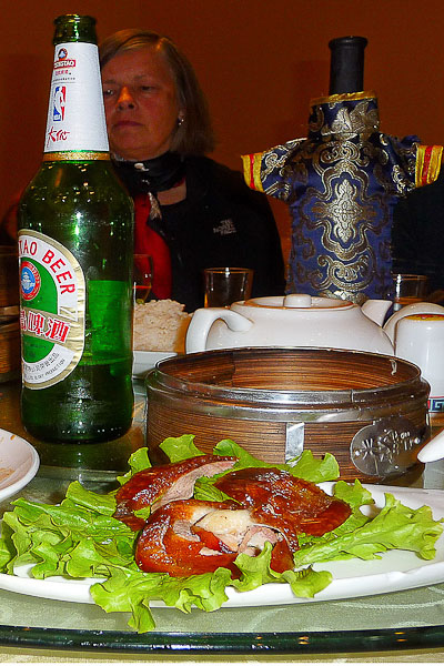 It is the traditional and delicious Beijing Duck when you are in this city.