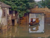 Canal boats transport passengers up and down Suzhou's canals.