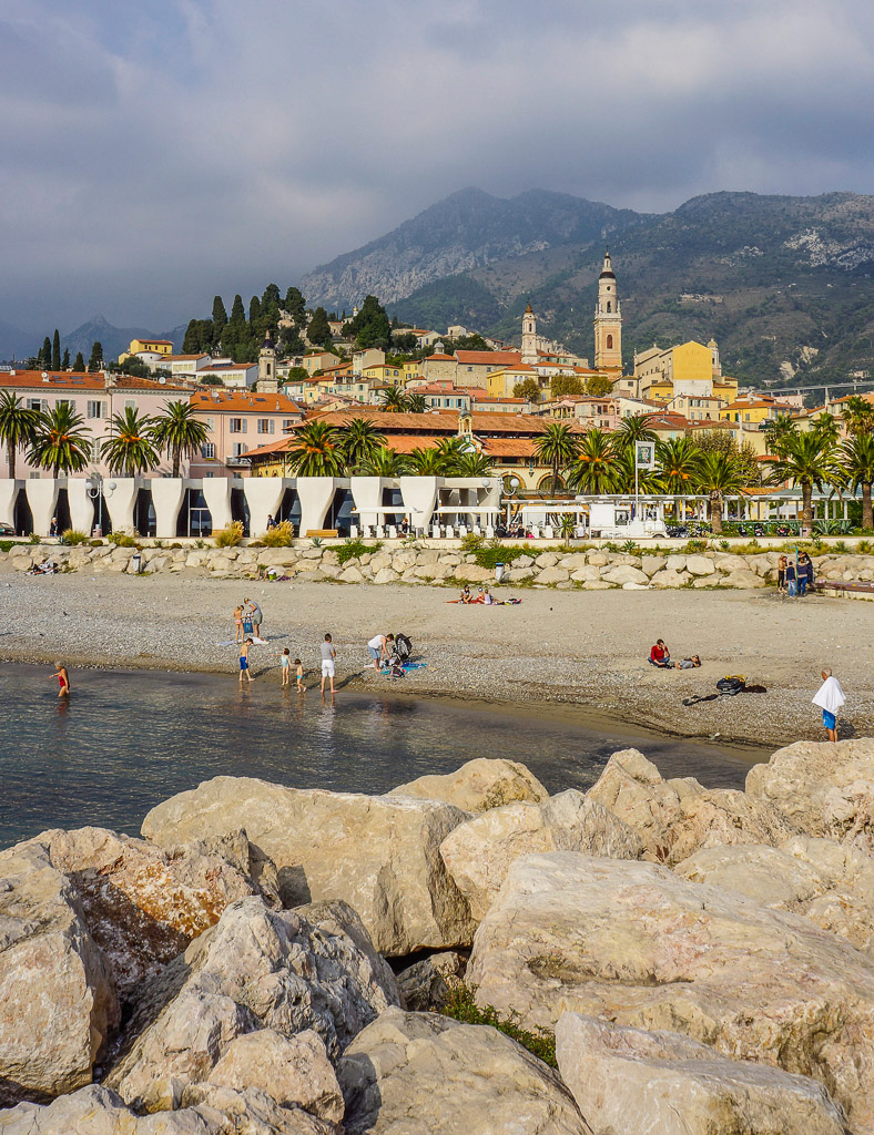 A beautiful beach with the Alpes Maritimes mountains as a backdrop.