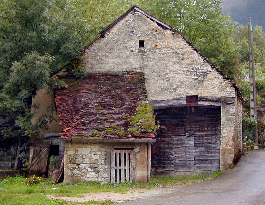 A well weathered barn n Port Lesney, a small village in the Franche-Comté.