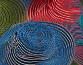 An abstract close up of some colorful summer hats.