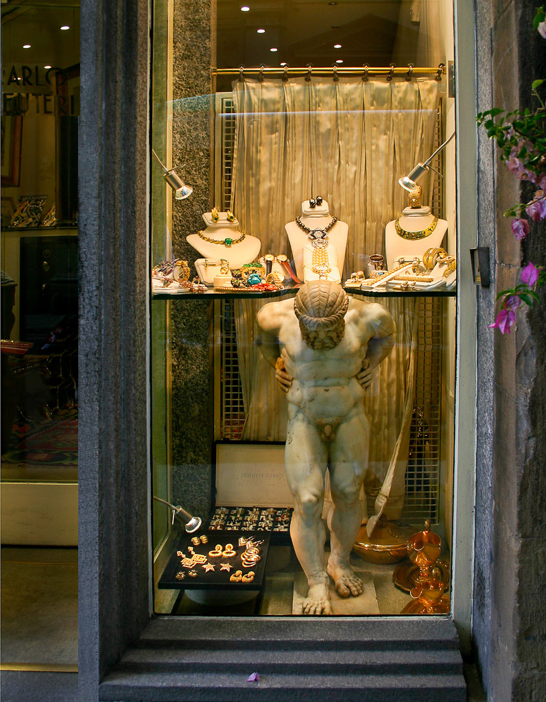 Many stores in today's Florence use past history to inspire their window displays.
