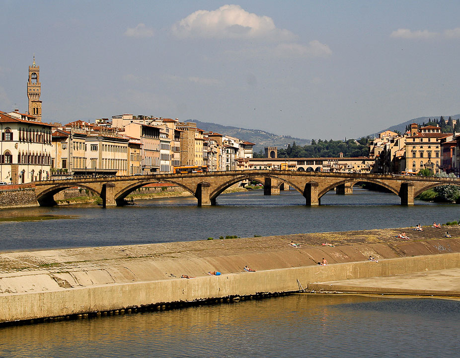 A favorite spot for sunbathers is along the Arno River in Florence.