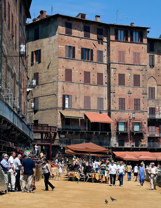 The piazza is  famous as the site of the Palio horse races during the summer in Siena.