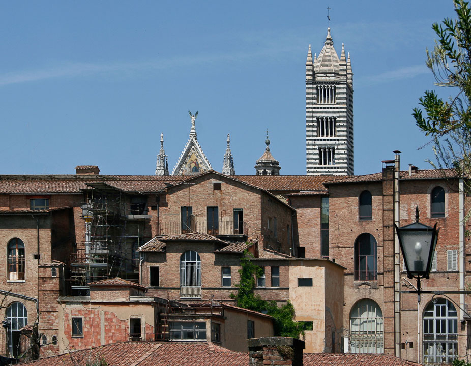 Another one of Siena's cathedrals provides a back drop to a view of the city's back side.