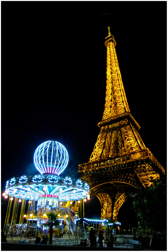 At night the Eiffel neighborhood  takes on the air of a busy amusement park.