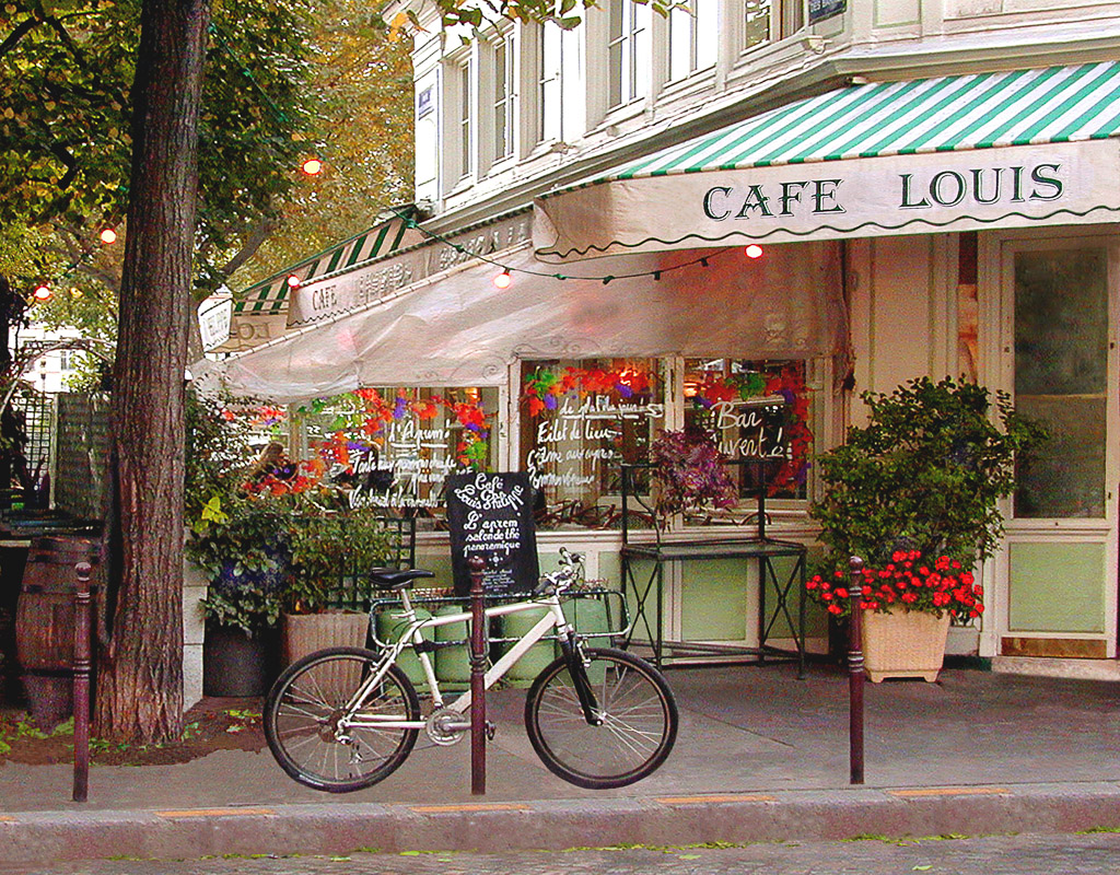 One of the left bank's many colorful side walk cafés.