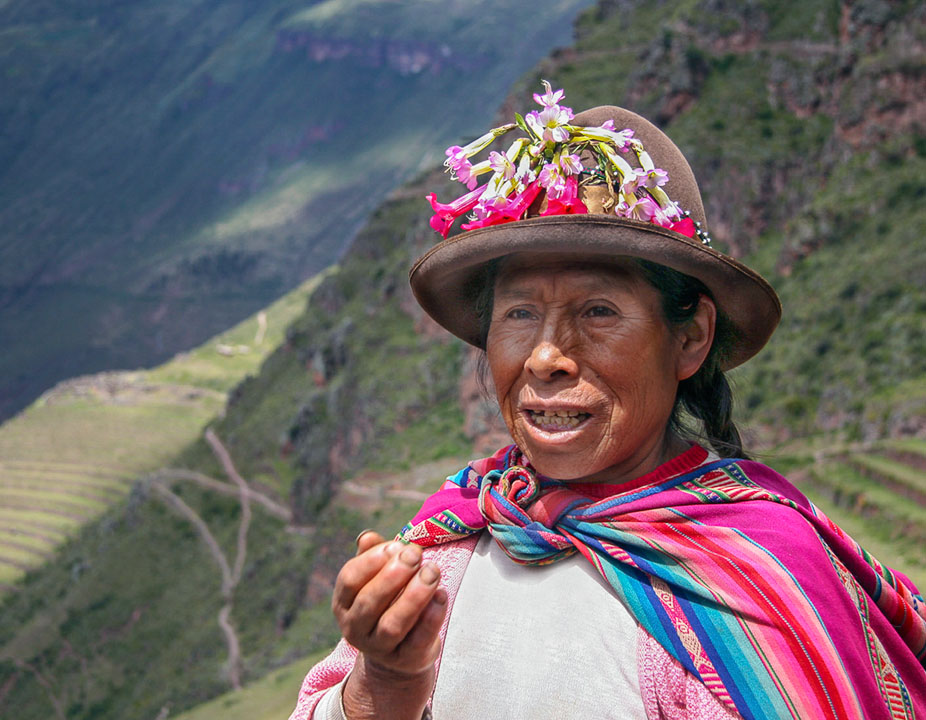 She sells souvenirs to tourists that venture to come high into the mountains.