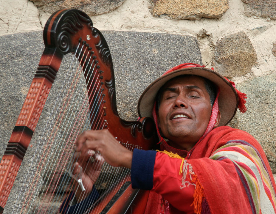 This blind harpist at the Sacred Valley plays music for the gods.