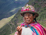 She sells souvenirs to tourists that venture to come high into the mountains.