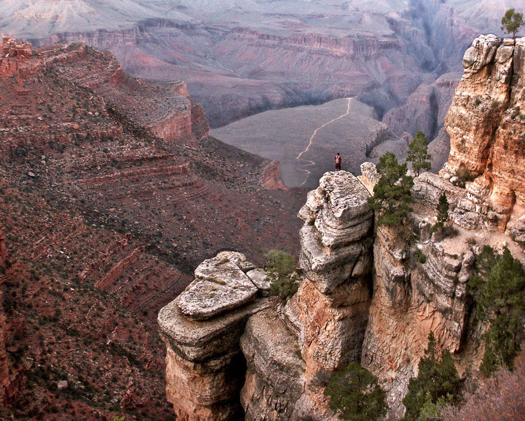 A person feels very insignicant staring into the vastness of the Grand Canyon.